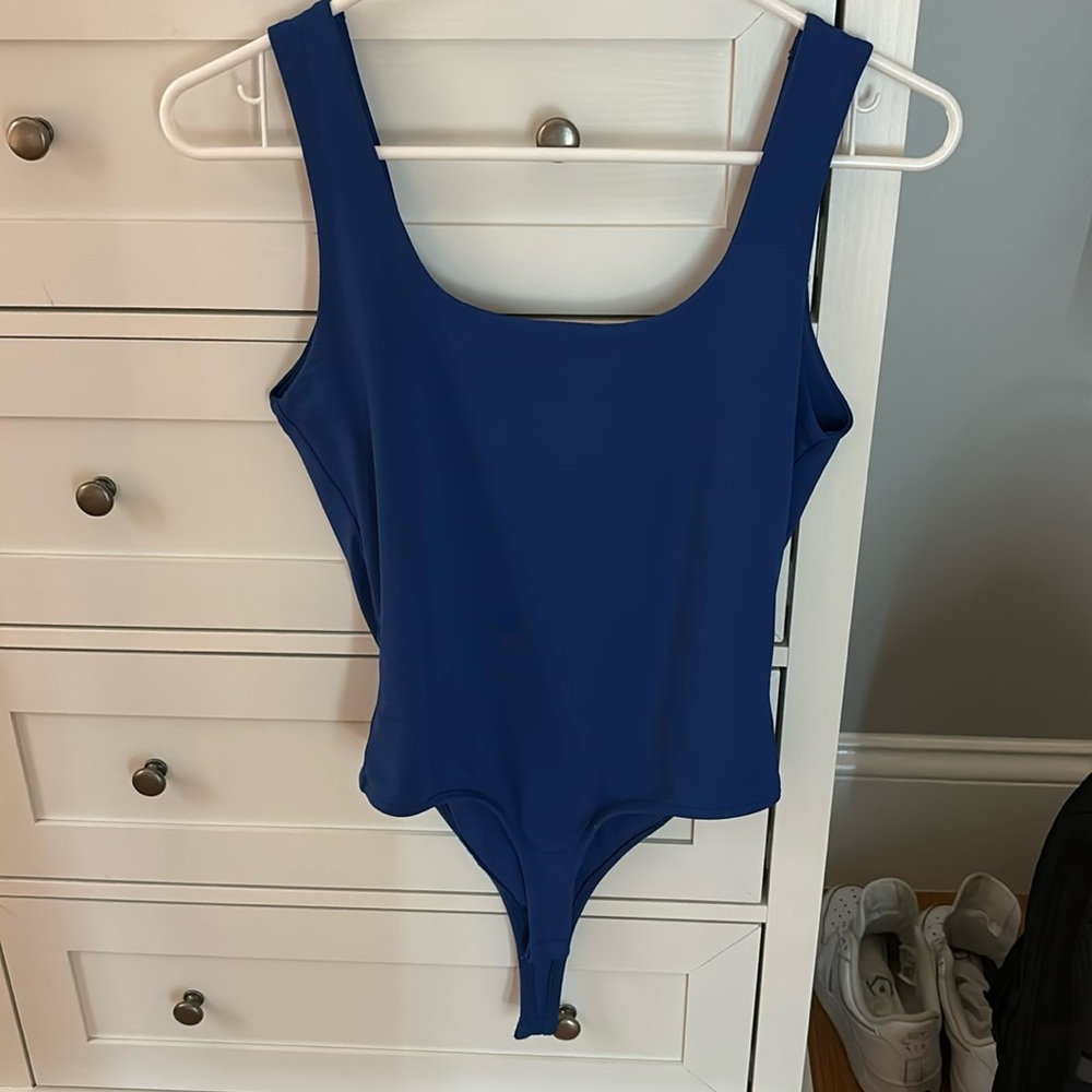 Blue body suit